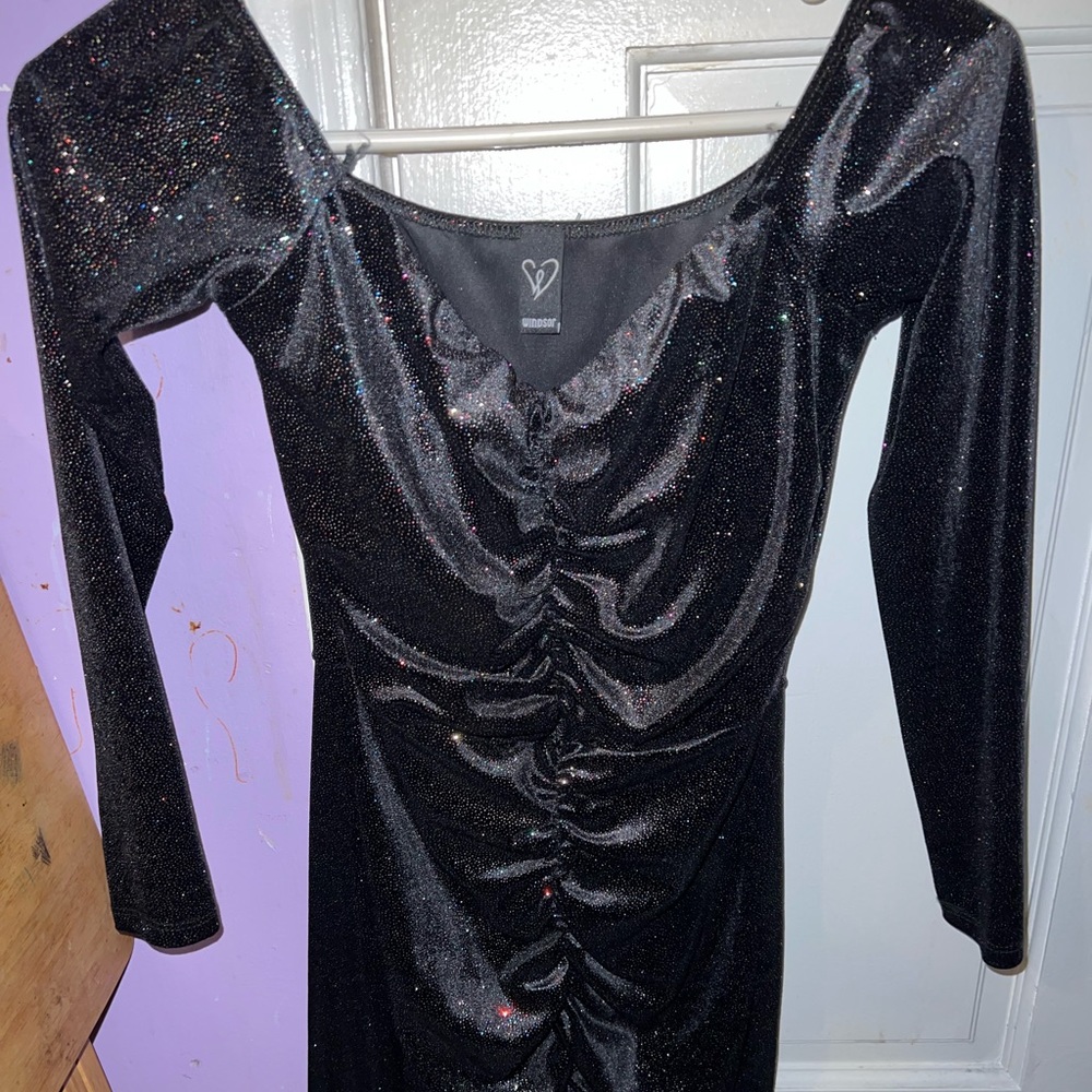 Black sparkly New Year’s Eve dress